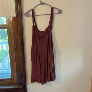 Rust Red sleeveless romper with adjustable buttons